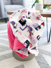 Load image into Gallery viewer, Cozy Hit The Road toddler Minky blanket, designed to provide ultimate softness and comfort for your little one during playtime, naps, and bedtime.