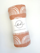 Load image into Gallery viewer, Ultra-soft Dusty Pink Arches bamboo swaddle, designed for comfort and perfect for soothing your newborn.