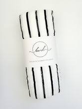 Load image into Gallery viewer, Luxuriously soft Black Stripe bamboo swaddle, designed to offer gentle comfort and support for your newborn.